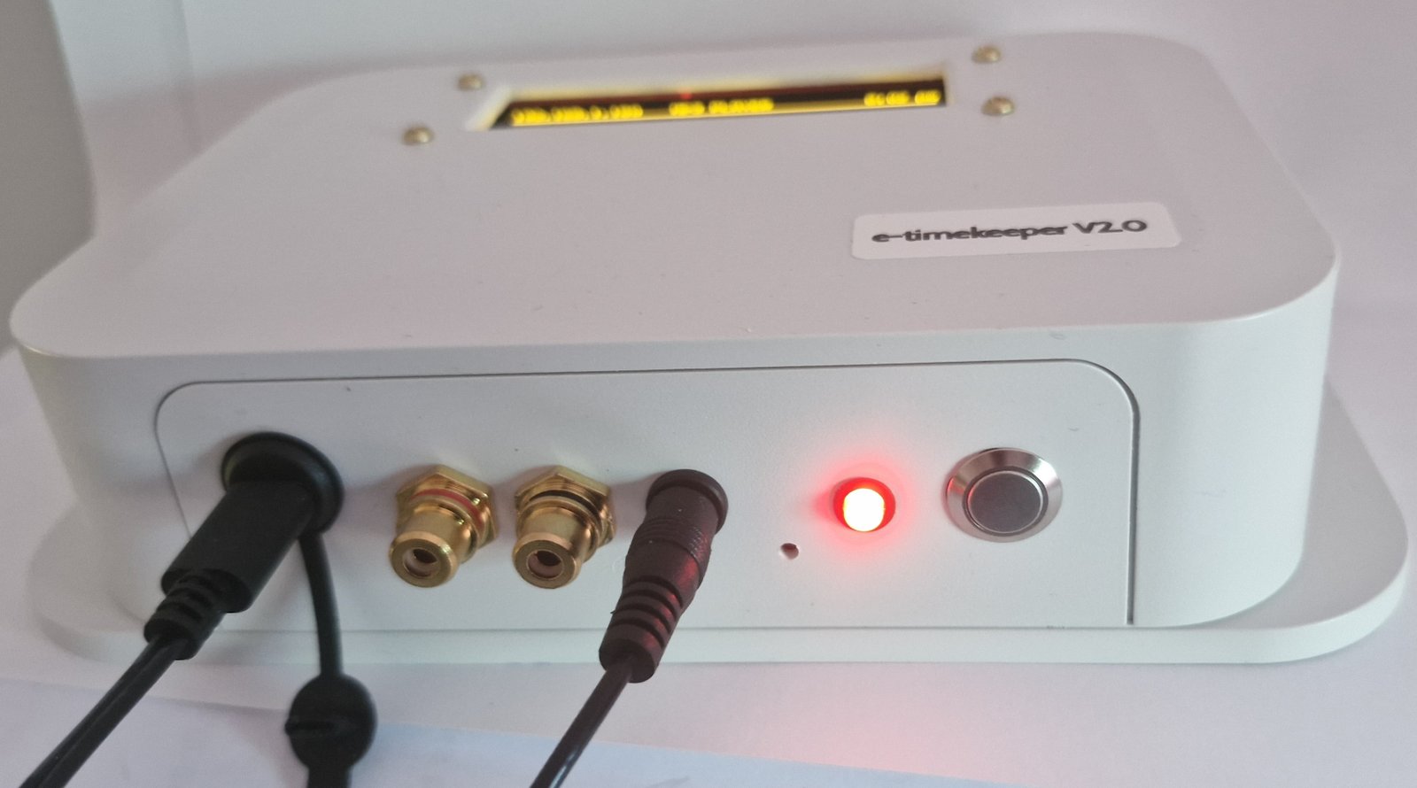 Audio output connectors and status light on the e-Timekeeper controller